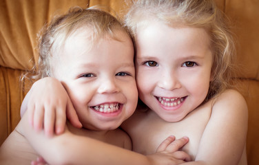 happy little brother and sister