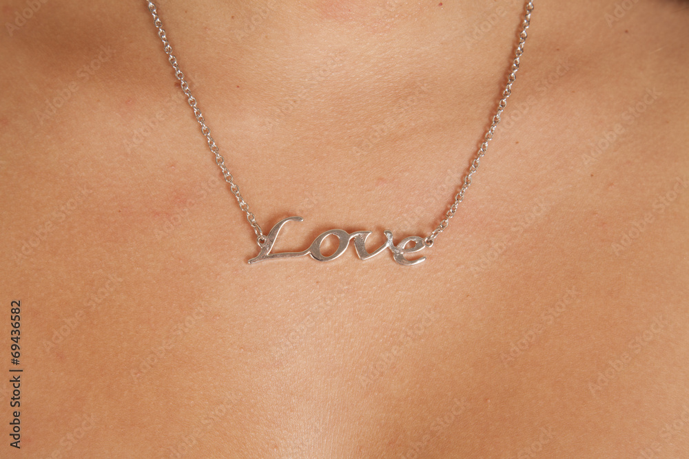 Wall mural love saying necklace