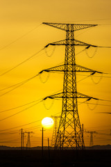 Fototapeta premium sunset over a windfarm