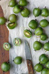 Mini kiwi, whole and halved