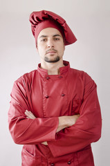 Serious chef posing in studio shot
