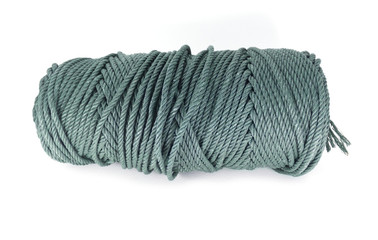 A coil of green rope isolated