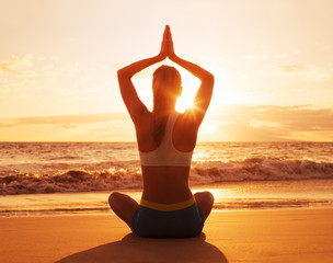 Fototapeta na wymiar Yoga Woman at Sunset