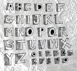 Hand drawn letters font written on wall texture background desig