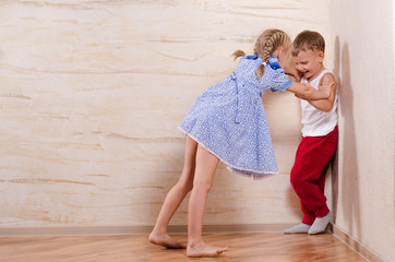 Boy and Girl Kids Playing at Home