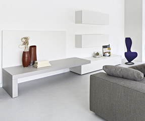 interior view of a modern living room with fabric sofa