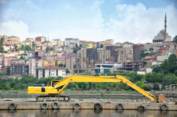 Excavator Parked On An Islet, Istanbul, Turkey