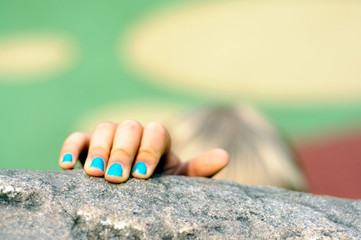 Naklejka premium Kid's hand in closeup