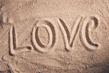 Love message written in sand