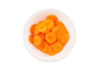 Chopped carrot in a bowl over white background