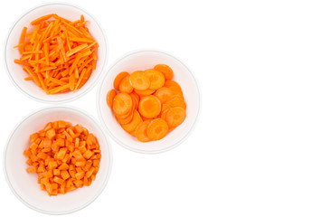 Different style of chopped carrots in white bowls