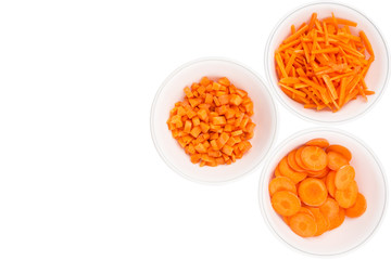 Different style of chopped carrots in white bowls