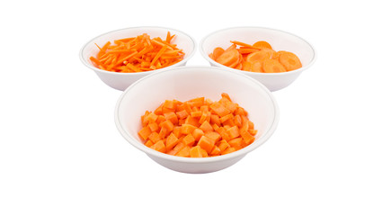 Different style of chopped carrots in white bowls