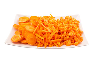 Different style of chopped carrots in white plate 