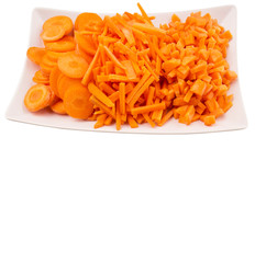 Different style of chopped carrots in white plate 