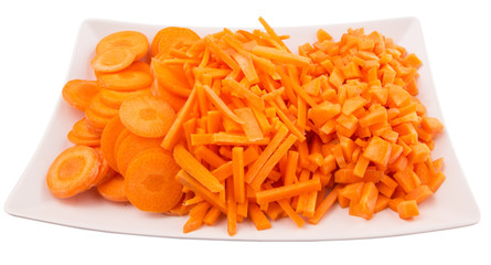 Different style of chopped carrots in white plate 