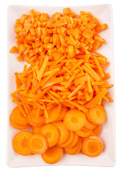 Different style of chopped carrots in a plate 