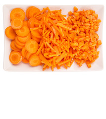 Different style of chopped carrots in a plate 