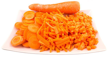 Different style of chopped carrots in a plate 