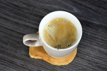 Tapeten Heerlijke verse koffie met muffin © trinetuzun