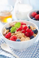 healthy breakfast with cornflakes and berry