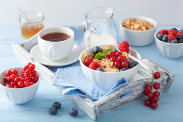 healthy breakfast with cornflakes and berry