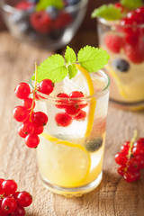summer lemonade with berry and lemon