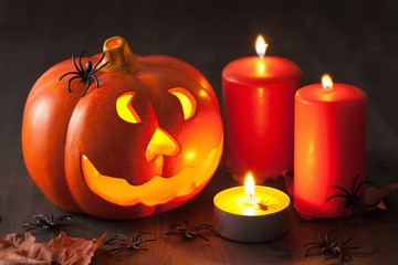 Obraz na płótnie Canvas Halloween Jack O Lantern pumpkin spiders candles