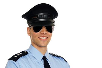 Portrait of young policemen in sunglasses