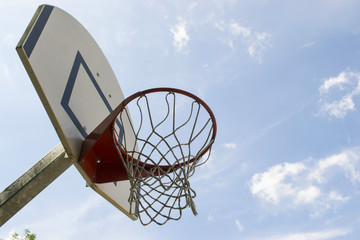 Basketabll hoop under blue sky