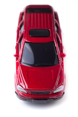 Macro red toy car top front view