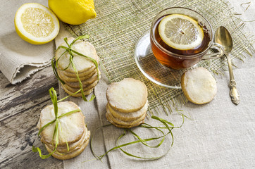 Homemade lemon sugar cookies and cup tea