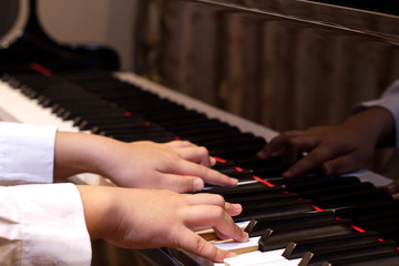 Obraz premium Playing a Piano