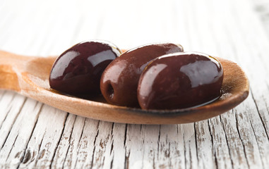 Kalmata olives wooden spoon