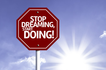 Stop Dreaming, Start Doing! red sign with sun background