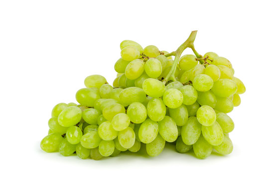 bunch of ripe and juicy green grapes  on a white background