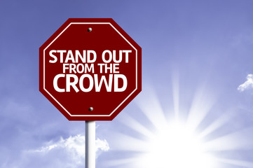 Stand Out From the Crowd red sign with sun background