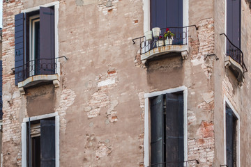 Fototapeta na wymiar Rustic windows on european old homes