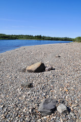 Pebble beach North of the river.