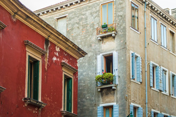 Naklejka premium Rustic windows on european old homes