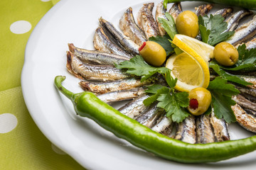 Fried anchovy in the plate.