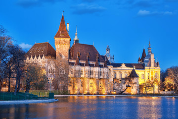 Vajdahunyad castle in the evening with lake, Budapest, Hungary