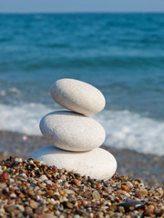 Fototapeta na wymiar White Spa stones on the beach. 