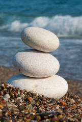 Obraz na płótnie Canvas White Spa stones on the beach. 