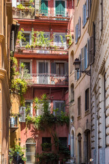 Obraz premium Rustic windows on european old homes