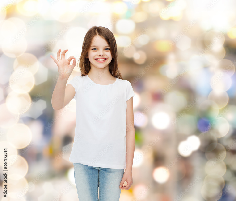 Sticker smiling little girl in white blank t-shirt