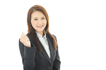 ガッツポーズの女性