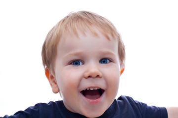 Toddler blond and blue eyes boy child with various facial expres
