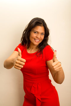 Happy Woman Showing Thumbs Up Gesture.