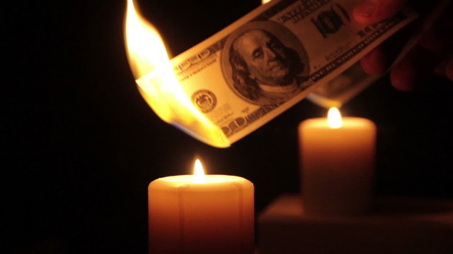 Money dollars burn